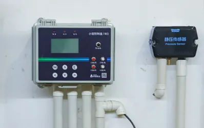 Control panel with multi-function buttons for ventilation, temperature, and alarm settings.